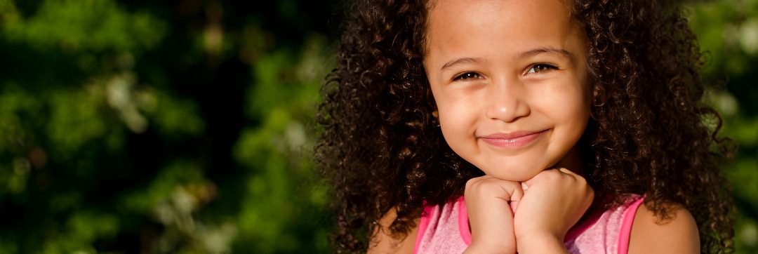 Young girl posing in sunlight